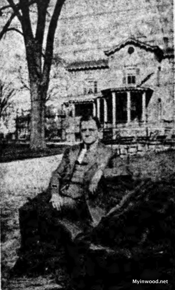 Writer of article, Clifford N. Shurman, sitting in front of the old Isham home, New York Herald, May 17, 1914.