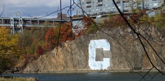 Columbia C on cliff wall above the Spuyten Duyvil.