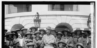 Florence Harding poses with Girl Scouts in 1922