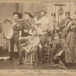 Samuel Isham, seated at left with other artists in 1889.