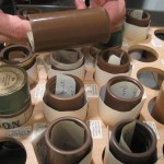 A sound engineer holds one of the Mapleson cylinders, in the Rodgers and Hammerstein Archives of Recorded Sound, The New York Public Library for the Performing Arts