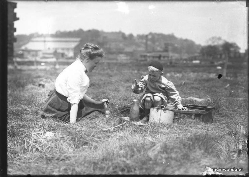 Ethel Magaw Hassler and William Gray Hassler picnicking in a field, Inwood circa 1911, photo by William Hassler, NYHS.