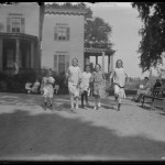 William Davis Hassler and four unidentified girls running in Isham Park, New York City, undated ca. 1911-1914 NYHS