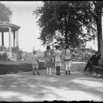 William Davis Hassler and four unidentified girls, seen from behind, Isham Park, Inwood, New York City, undated ca. 1913-1914